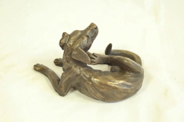 bronze resin Dog lying scratching 12 x 6 cm