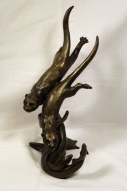 bronze resin Otters hunting fish