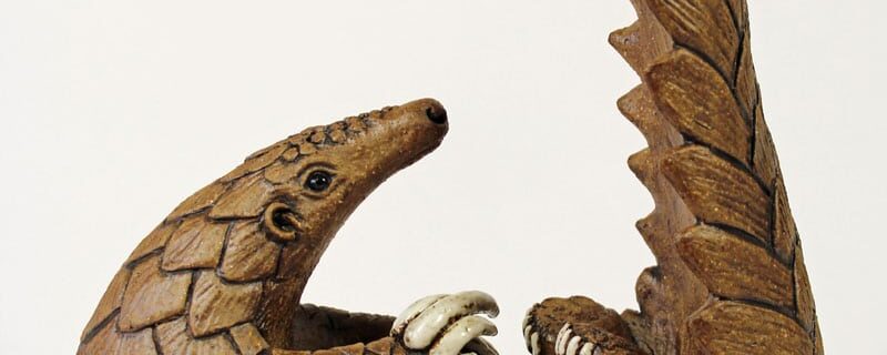 Curled up Pangolin - ceramic clay sculpture